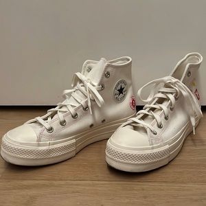 Like- new Converse with unique flower details!